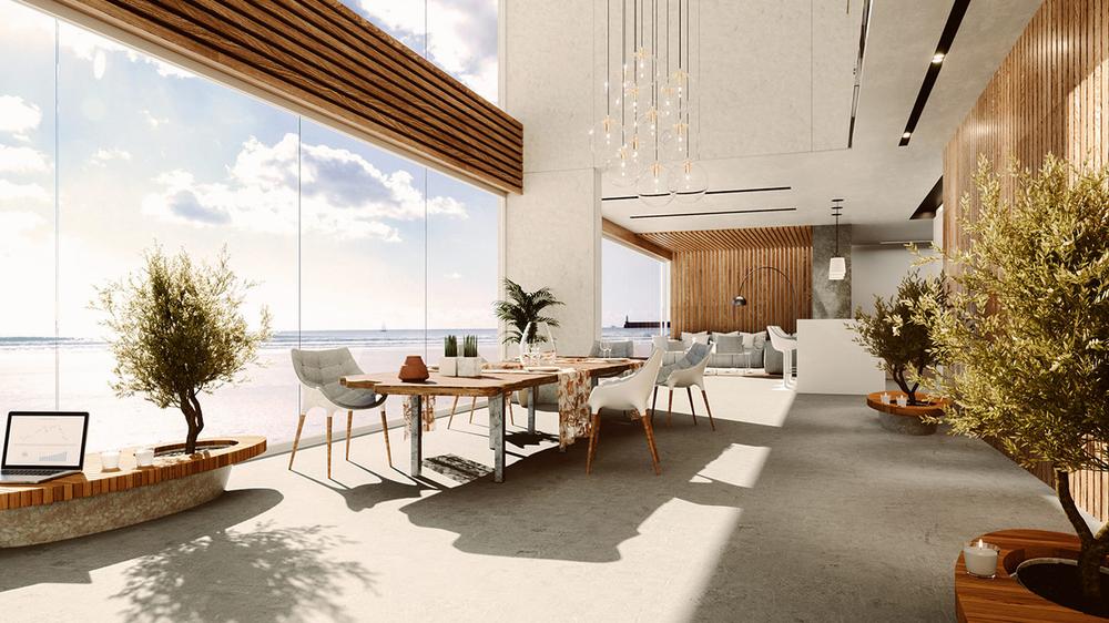 A dining room with a large window looking out onto the ocean.